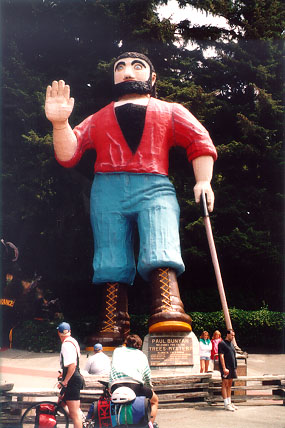 Jeremy posing as Paul
                    Bunyan at Trees of Mystery in Northern California